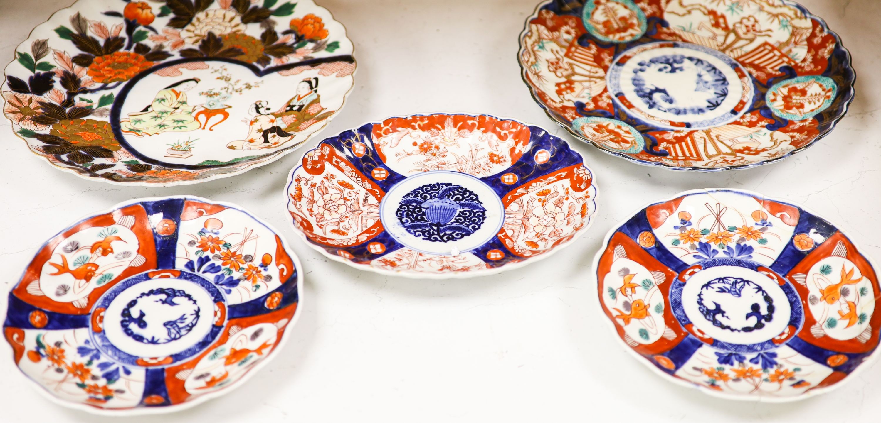 Five Japanese Imari dishes, largest 30.5 cm